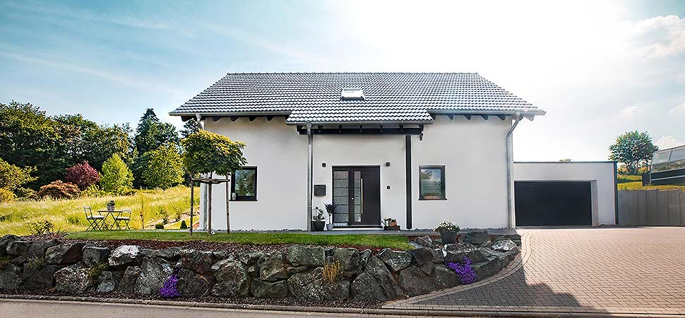 Offen für eine 5-köpfige Familie: Das moderne energiesparende Fingerhut Haus Amika. Foto: Fingerhut Haus