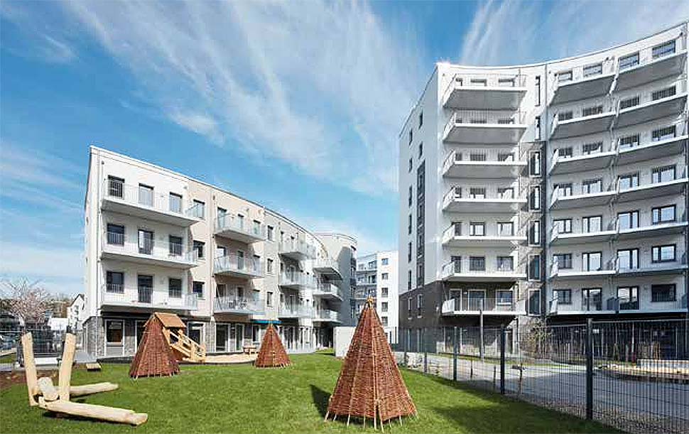 Neuer Wohnraum durch umgebaute Büros: Das „Living Circle“ in Düsseldorf. Foto: Manos Meisen / BHW Bausparkasse