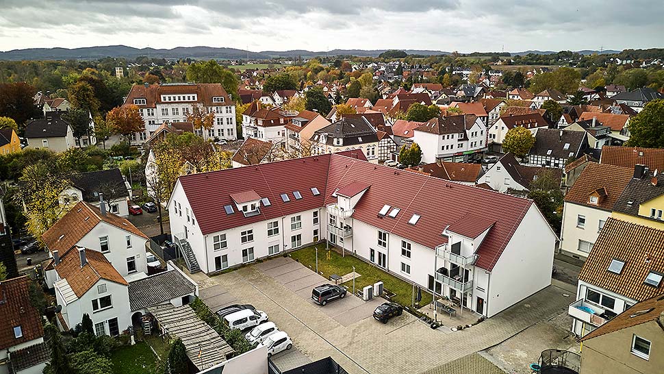 Auch Bauherren großer Wohnungs- und Objektbauten profitieren von der Planungssicherheit des Holz-Fertigbaus. Foto: BDF / GUSSEK HAUS