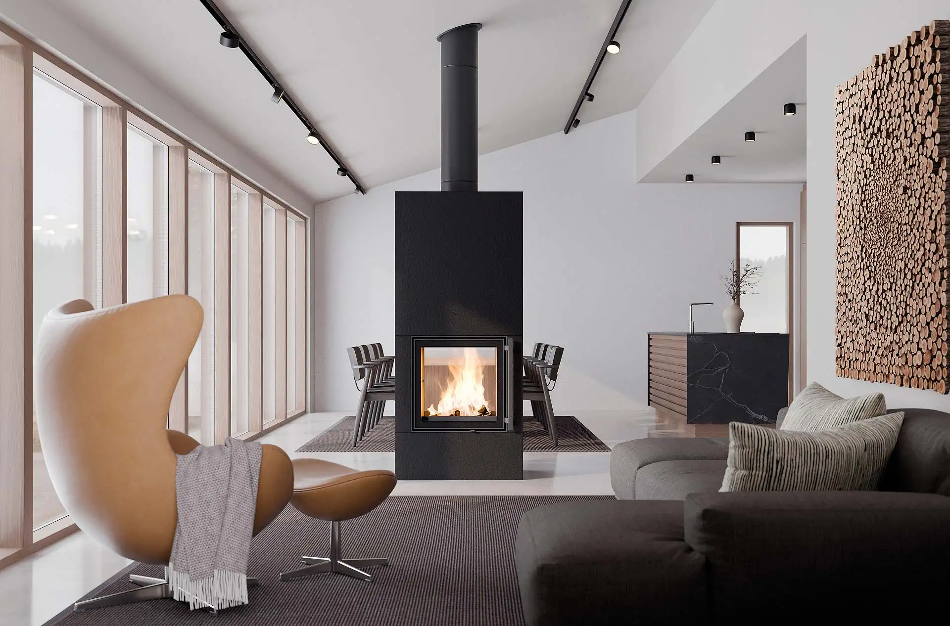 Hei&szlig;er Raumteiler: Ein Specksteinofen mit Tunnelt&uuml;r sorgt nicht nur f&uuml;r langanhaltende W&auml;rme, sondern ist auch ein attraktives Stilelement. (Foto: HLC/Tulikivi)